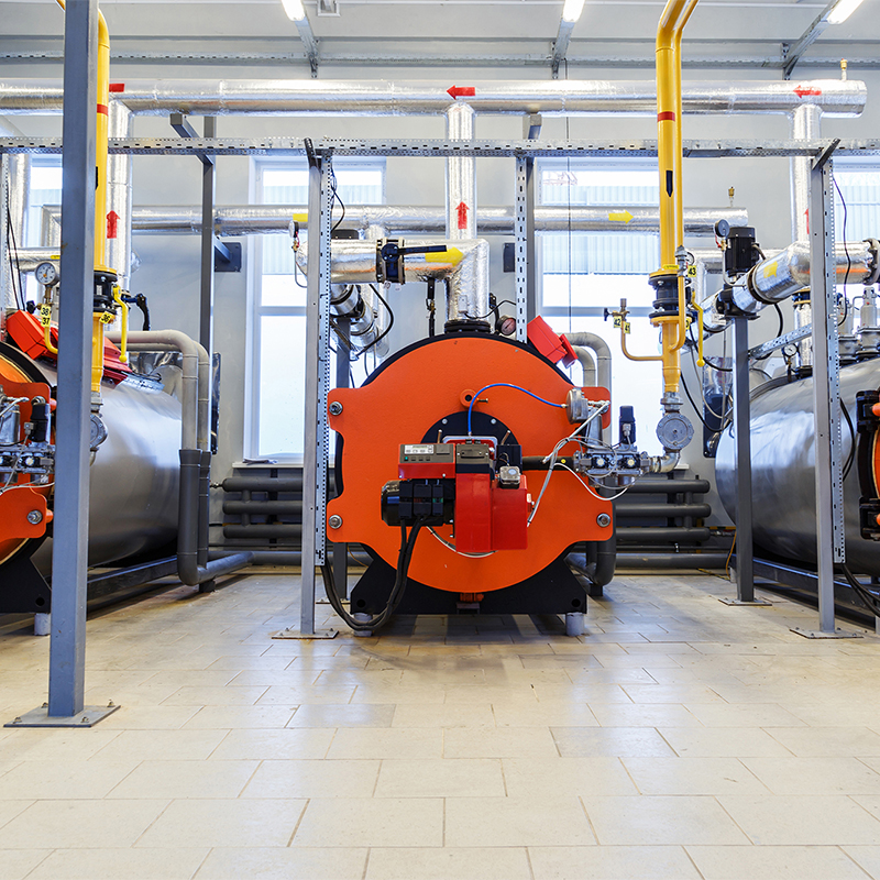 Industry automatical boiler gas burners. Interior of modern boiler house.